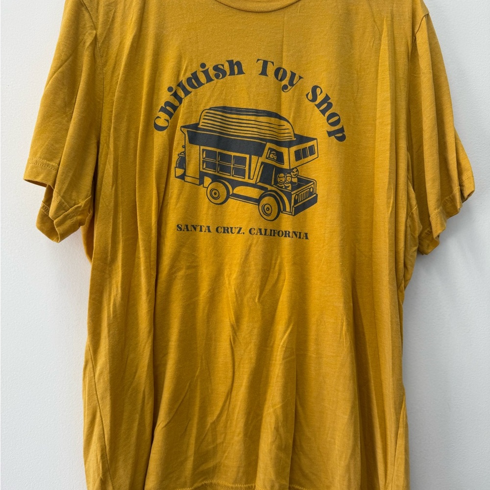 Yellow childish toy shop shirt from Santa Cruz CA